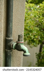 Rusty Vintage Faucet On A Wall