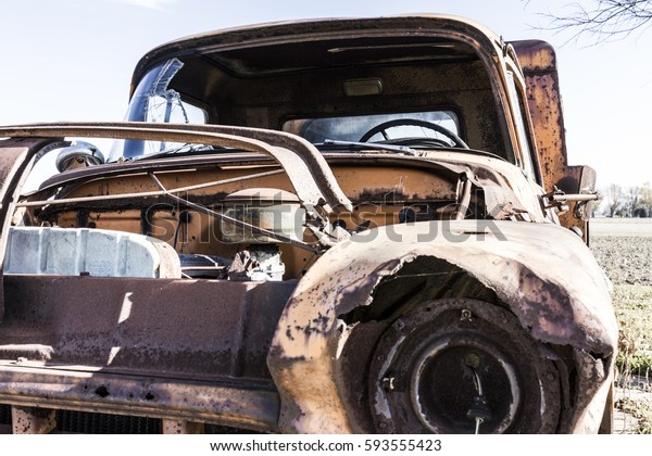 Rusty vintage\
junk truck abandoned on a farm\
I