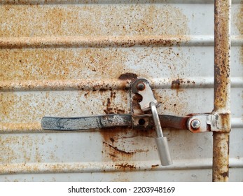 Rusty White Metal Plate Door With Padlock