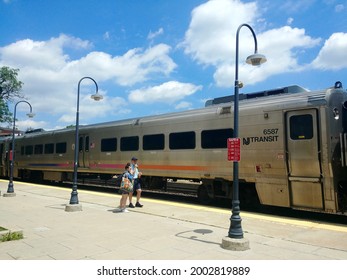 Rutherford, New Jersey, USA - June 20, 2021: New Jersey Transit Commuter Train At Rutherford Station