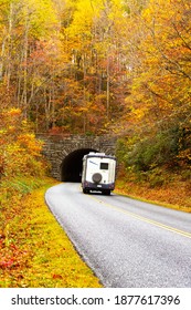 An RV Camper Travels Toward The Tunnel On The Blue Ridge Parkway In Fall