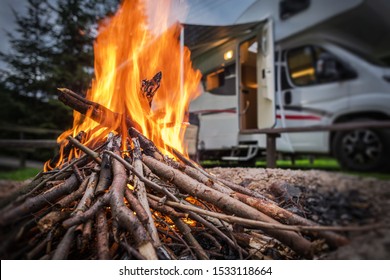 RV Park Campfire in Front of Motorhome Pitch. Summer Camping with Motorhome. - Shutterstock ID 1533118664