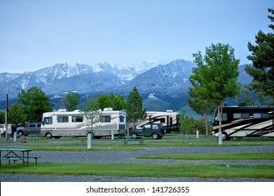 RV Park in Montana. Recreation Vehicles in the RV Park. Montana Mountains on the Horizon. Montana RV Trip. - Shutterstock ID 141726355