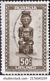 RWANDA - CIRCA 1948: A Postage Stamp From RWANDA , Showing An African Statue Indigenous Art. Circa 1948