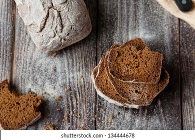 Rye bread pieces on the boards, closeup
