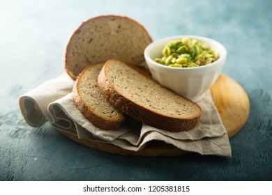 Rye Bread Served With Avocado Dip