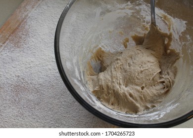 Rye Buckwheat dough rising in a bowl with a flour board dusted and used for baking - Shutterstock ID 1704265723