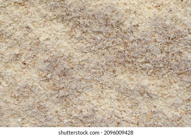 Rye flour background, top view. Texture, background from rye flour, top view. Chopped rye flour, top view.