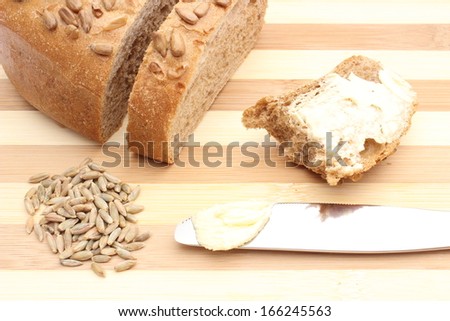 Similar – Foto Bild gebackenes Roggenbrot liegt Mehl auf einem Textiltuch.