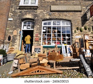 RYE, SUSSEX, UK - MARCH 7, 2015. The Tower Forge sells re-claimed furniture, signs, wood and iron building items from its shop and forecourt at Hilder's Cliff in Rye, a town in Sussex, England, UK. - Shutterstock ID 260633015