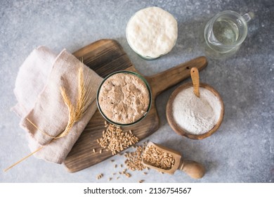 The rye and wheat leaven for bread is active. Starter sourdough ( fermented mixture of water and flour to use as leaven for bread baking). The concept of a healthy die - Shutterstock ID 2136754567