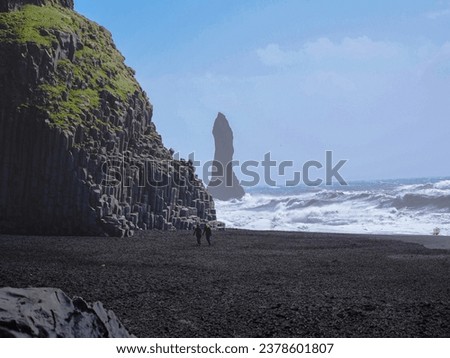 Rynisfjara black sand beach, iceland. black sand beach and reynisdrangar stack rocks of vik i myrdal, iceland. northern europe.
