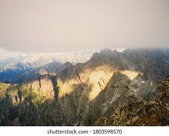 Rysy Tatry Peak Poland Obscured By Clouds At Sunset.