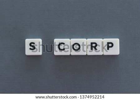 S Corp word made of square letter word on grey background.