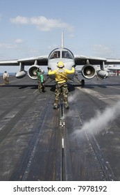 An S-3B Viking Being Taxied Onto A Catapult By A 