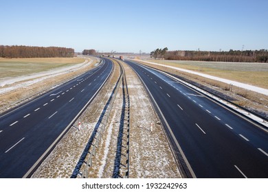 S5 expressway, highway after snowfall, vehicles lifting water droplets into the air. Early spring. Gniezno, Poland.