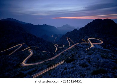 Sa Calobra road at night, marked by car lights,  Escorca.Sierra de Tramuntana.Mallorca.Balearic Islands. Spain. - Powered by Shutterstock