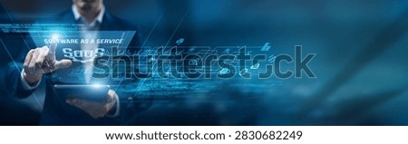 SaaS manager using a smart tablet for performance monitoring software as a service platforms, subscriptions automation scalability integration analytics performance.