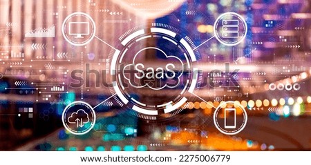 SaaS - software as a service concept with big city lights at night