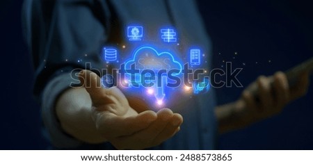 SaaS, software as a service concept for software services on cloud system. Internet and networking technology. Businessman using smartphone to show SaaS icons on virtual screen.