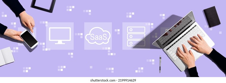 SaaS - software as a service concept with two people working together