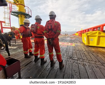 SABAH, MALAYSIA - 30 OCTOBER 2020, offshore marine crew working on deck during cargo handling operation at sea