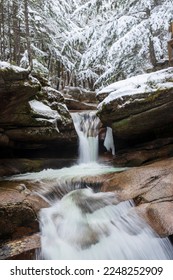 Sabbaday Falls during a cold winter day in the White Mountain National Forest of New Hampshire.