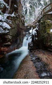 Sabbaday Falls during a cold winter day in the White Mountain National Forest of New Hampshire.