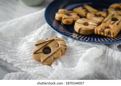 Sable Cookies With Jam And Icing Sugar 