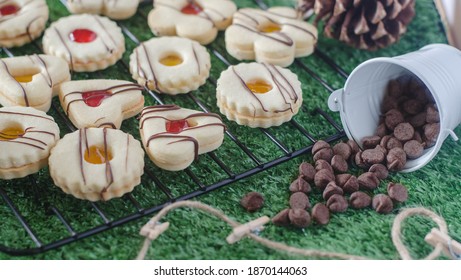 Sable Cookies With Jam And Icing Sugar 