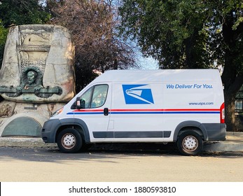 Sac, CA - December 19, 2020: New USPS Mail Delivery Truck Parked Outside.