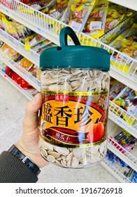 Sac, CA - February 13, 2021: Plastic Bin Of Chinese Labeled Salted Pumpkin Seeds Inside A Supermarket. 