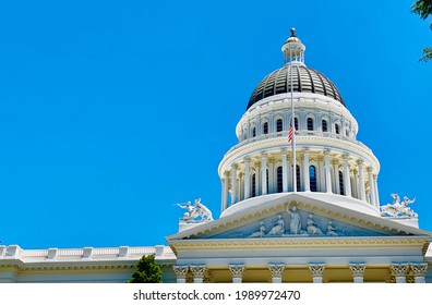 Sac, CA - May 12, 2021: Closeup Of California State Capital Building Against Blue Sky. 