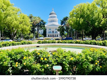 Sac, CA - May 12, 2021: Wide View Of The State Capitol Building With An Empty Fountain And Rose Garden In Foreground. 