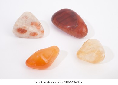 Sacral Chakra Healing Gemstone Shot Against A White Background