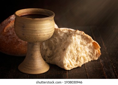 The Sacrament of Holy Communion  on a Dark Wooden Table - Shutterstock ID 1938030946