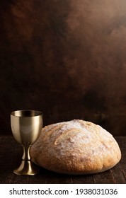 The Sacrament of Holy Communion  on a Dark Wooden Table - Shutterstock ID 1938031036