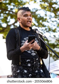 SACRAMENTO, CA, U.S.A. - OCTOBER 9, 2021: Josie Robo, A Spoken Word Artist, Reads Their Poem 