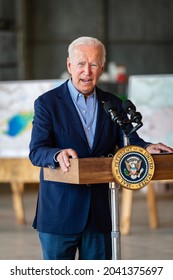 SACRAMENTO, CA, US.A. - SEPT. 13, 2021: President Joe Bidemakes a point while addressing the press. Maps related to the area's wildfires are behind him, and Biden's visit included an aerial tour.