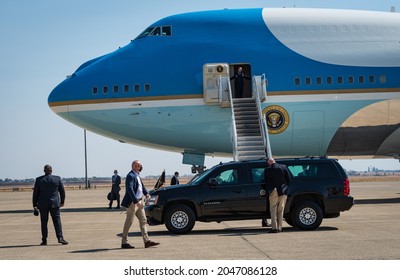 SACRAMENTO, CA, US.A. - SEPT. 13, 2021: Secret Service Agents And A Car Await President Joe Biden Descending From Air Force One After Arriving To Get Updated On The State's Wildfire Response.