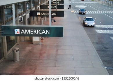 Sacramento, California - 2019: Departures area as seen from above at the Sacramento International Airport SMF. Signs for American and Delta Airlines. No people. Room for print. 