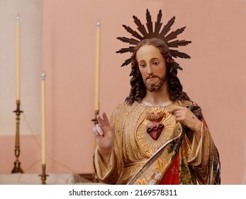 Sacred Heart of Jesus Statue. Jesus shows his own heart, symbol of God's love - Nine First Fridays Devotion - Shutterstock ID 2169578311