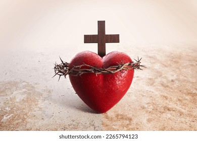 Sacred Heart of Jesus, surrounded by a crown of thorns and with wooden cross