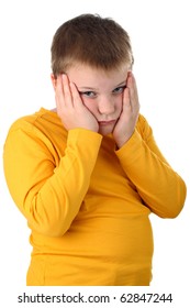 Sad 10 Year Old Boy Holding His Cheeks Isolated On White