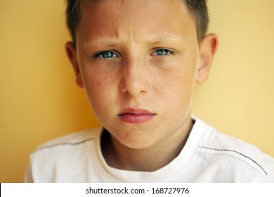 Sad 8-10 Years Old Boy