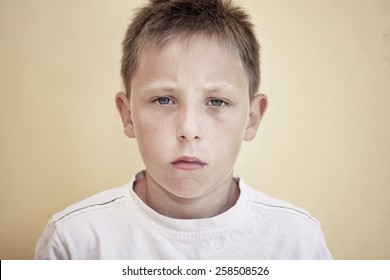 Sad 8-11 Years Old Boy