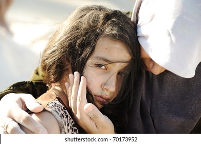 Sad Abused Girl In Arms Of Her Mom, Gaza - Egypt