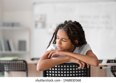 Sad African-American Girl At School. Stop Racism