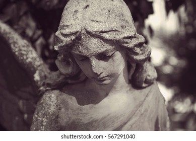 sad angel as a symbol of eternity, life and death