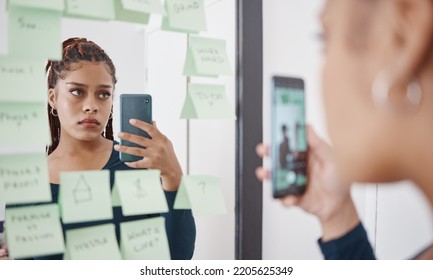 Sad, Anxiety And Woman At Mirror With Phone For Pensive Reflection Photograph For Social Media. Depressed Black Girl With Frustrated And Unhappy Face Thinking Of Self Esteem Problem In Distress.